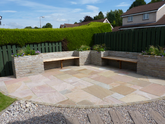 After: a large sandstone patio for entertaining is a key part of the new garden