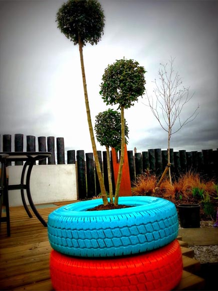 Old tyres can become an eye catching garden feature