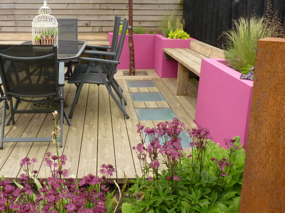 Adding colour to your rendered raised bed can change the feel of your garden