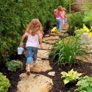 Children marching on stepping stones