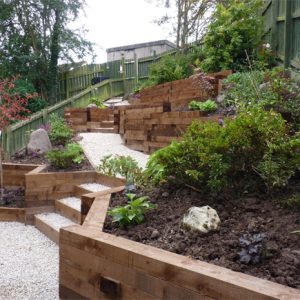 A terraced garden using sleepers for a softer, more natural look. Designed and built by Vialii