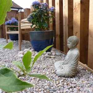 Adding gravel, pebbles, pots and statues in soggy areas can overcome the problem