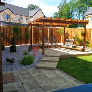 The pergola gives added privacy in this family garden