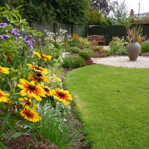 The new borders, curving path and feature pot