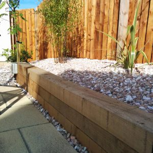 Sleeper retaining walls help with the slope
