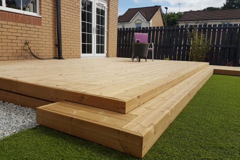 The new deck provides level access from the house