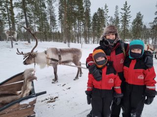Us with reindeer in Lapland
