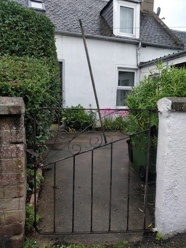 A wrought iron gate is a traditional and hard wearing design