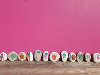 The painted stones are a beautiful addition to the garden