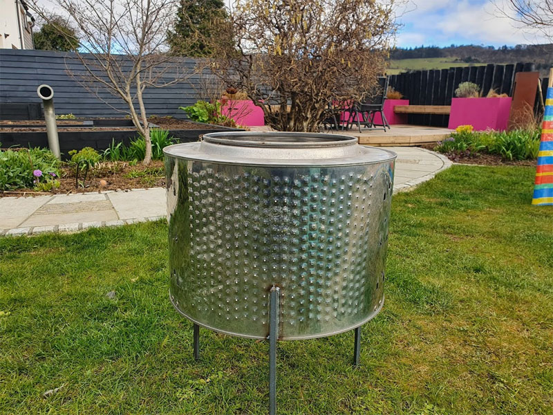 Our firepit made from an old washing machine drum