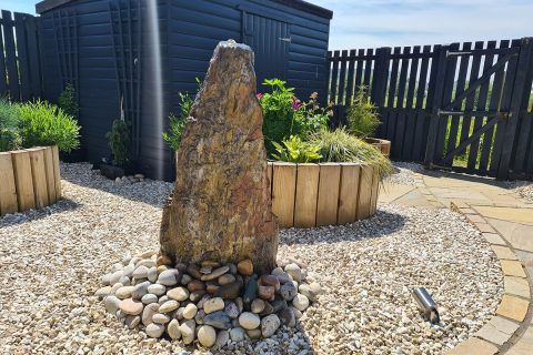 The standing stone water feature provides a relaxing trickle
