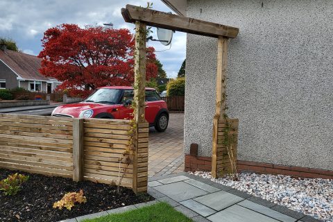 The new arbour creates a lovely entrance