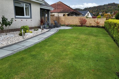 The existing lawn with the new path