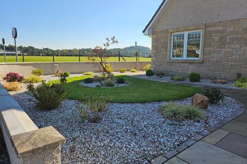 The new front garden is low maintenance and welcoming