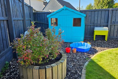 The play area and raised bed