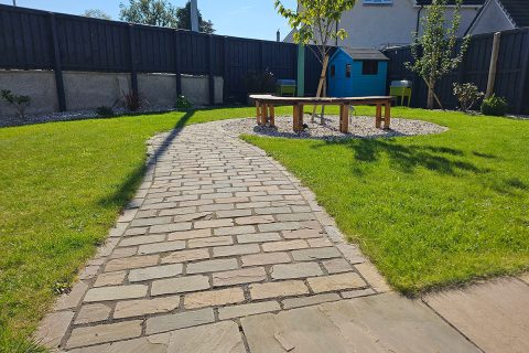 Follow the brick road to the new tree seat