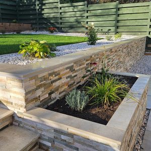 Creating a balance between paving, planting and lawn is important