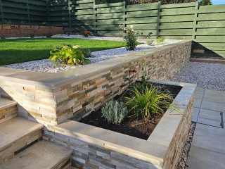 Creating a balance between paving, planting and lawn is important